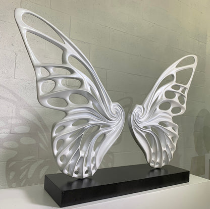 Name: Dream Machine - Pearl White . (Coffee Table Size) Medium: Volcanic stone resin mix / Concrete base Edition: 8 Size: (wings + base) 28”h x 42”w x 9”