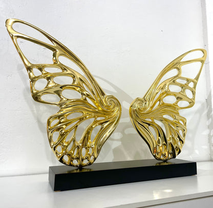 Name: Dream Machine - Golden Chrome. (Coffee Table Size) Medium: Volcanic stone resin mix / Concrete base Edition: 8 Size: (wings + base) 28”h x 42”w x 9”