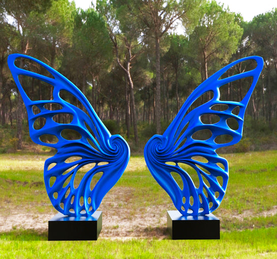 Name: Dream Machine – Blue Medium: Painted Fiberglass Sculpture with stainless steel Base. Size: 13’ x 4’ x 9’ ( Wings + Base). Signed: Hand-Signed. Edition: 1 of 6 Variations. Year: 2019