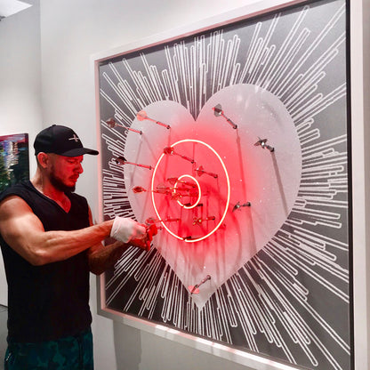 Name: LOVE HURTS - White on Silver/Blue and Red Neon. Media: Hand painted/SilkScreen/Diamond Dust/Neon light/Chrome Darts/Swarovski crystals. Size: 44 x 44 in. Edition : Unique + A.P