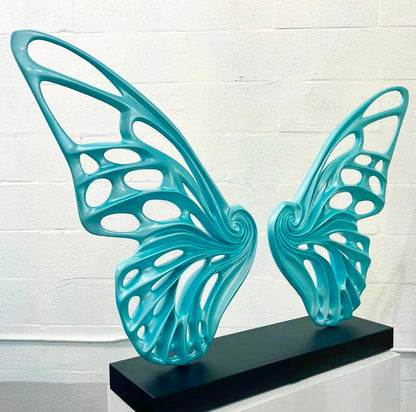 Name: Dream Machine - Tiffany Blue. (Coffee Table Size) Medium: Volcanic stone resin mix / Concrete base Edition: 8 Size: (wings + base) 28”h x 42”w x 9”
