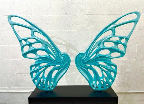Name: Dream Machine - Tiffany Blue. (Coffee Table Size) Medium: Volcanic stone resin mix / Concrete base Edition: 8 Size: (wings + base) 28”h x 42”w x 9”