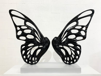 Name: Dream Machine - Black. (Coffee Table Size) Medium: Volcanic stone resin mix / Concrete base Edition: 8 Size: (wings + base) 28”h x 42”w x 9”