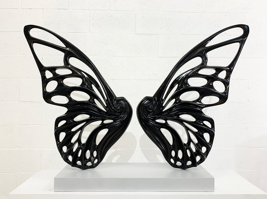 Name: Dream Machine - Black. (Coffee Table Size) Medium: Volcanic stone resin mix / Concrete base Edition: 8 Size: (wings + base) 28”h x 42”w x 9”