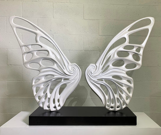 Name: Dream Machine - Pearl White . (Coffee Table Size) Medium: Volcanic stone resin mix / Concrete base Edition: 8 Size: (wings + base) 28”h x 42”w x 9”