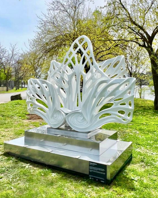 Name: Empower Flower
 Size: 10” x 10” x 4”
 Medium: painted Fiber Glass / stainless steel base
 Year : 2020