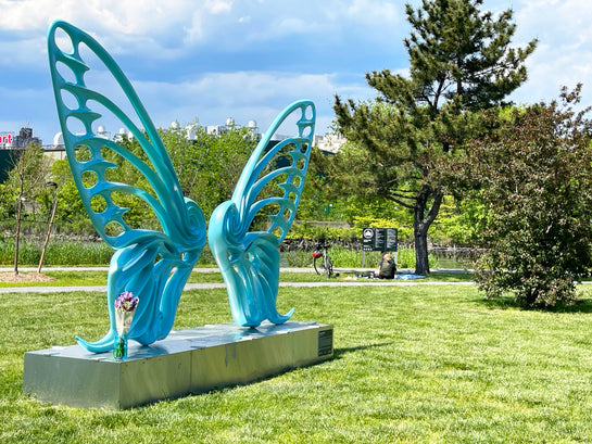 Name: Dream Machine II
 Medium: Painted 
Fiberglass Sculpture with stainless structure and Base.
 Size: 13’ x 4’ x 9’5 ( Wings + Base).
 Year: 2019