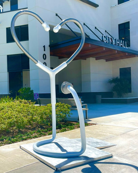 Name: Healing Heart 
Medium: FiberGlass and stainless steel 
Size: 11’ x 6’ x 5’
Year: 2020