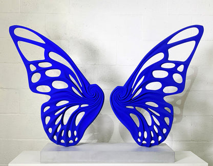 Name: Dream Machine - Cobalt Blue. (Coffee Table Size) Medium: Volcanic stone resin mix / Concrete base Edition: 8 Size: (wings + base) 28”h x 42”w x 9”