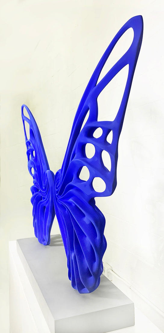 Name: Dream Machine - Cobalt Blue. (Coffee Table Size) Medium: Volcanic stone resin mix / Concrete base Edition: 8 Size: (wings + base) 28”h x 42”w x 9”