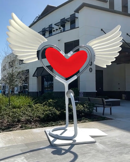 Name: Healing Heart 
Medium: FiberGlass and stainless steel 
Size: 11’ x 6’ x 5’
Year: 2020