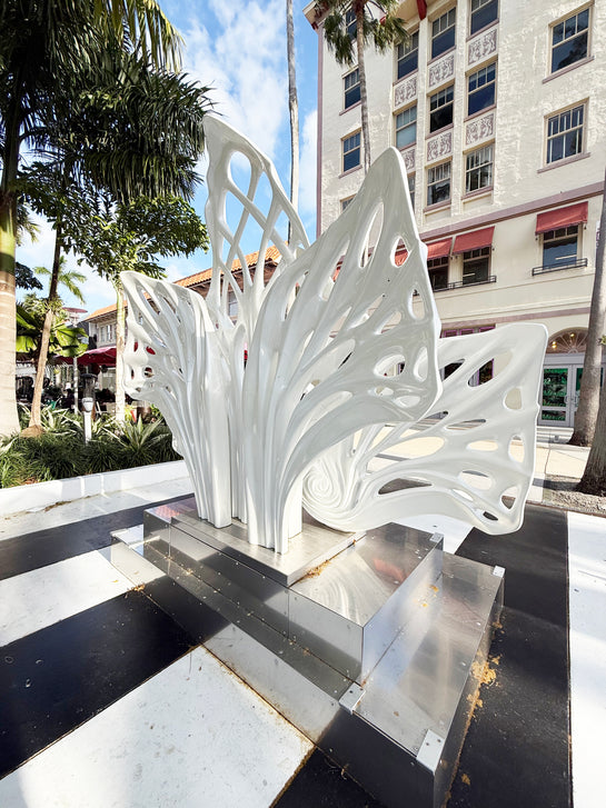 Name: Empower Flower
 Size: 10” x 10” x 4”
 Medium: painted Fiber Glass / stainless steel base
 Year : 2020