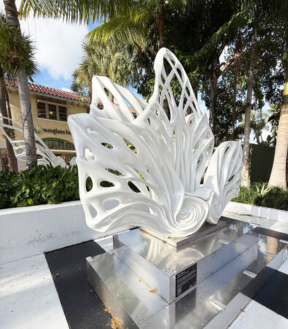 Name: Empower Flower
 Size: 10” x 10” x 4”
 Medium: painted Fiber Glass / stainless steel base
 Year : 2020