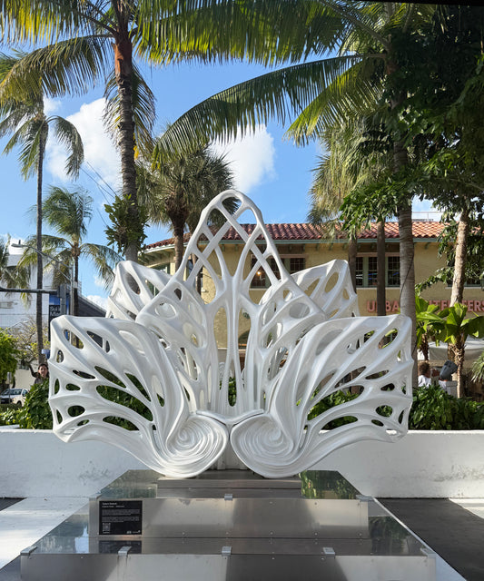 Name: Empower Flower
 Size: 10” x 10” x 4”
 Medium: painted Fiber Glass / stainless steel base
 Year : 2020